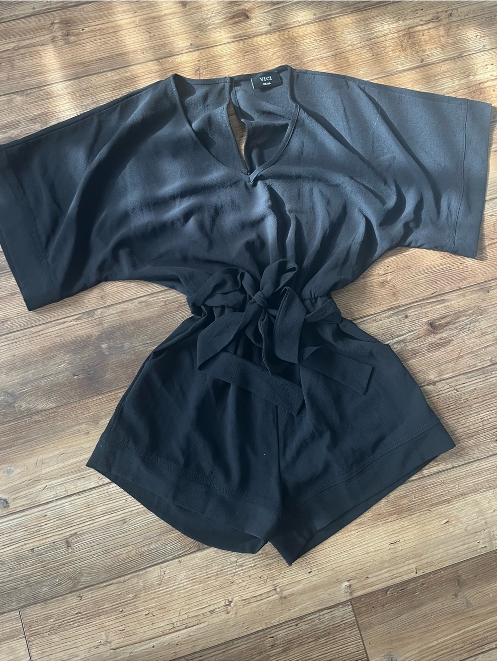 Vici Black Tie-Waist Romper with V-Neck